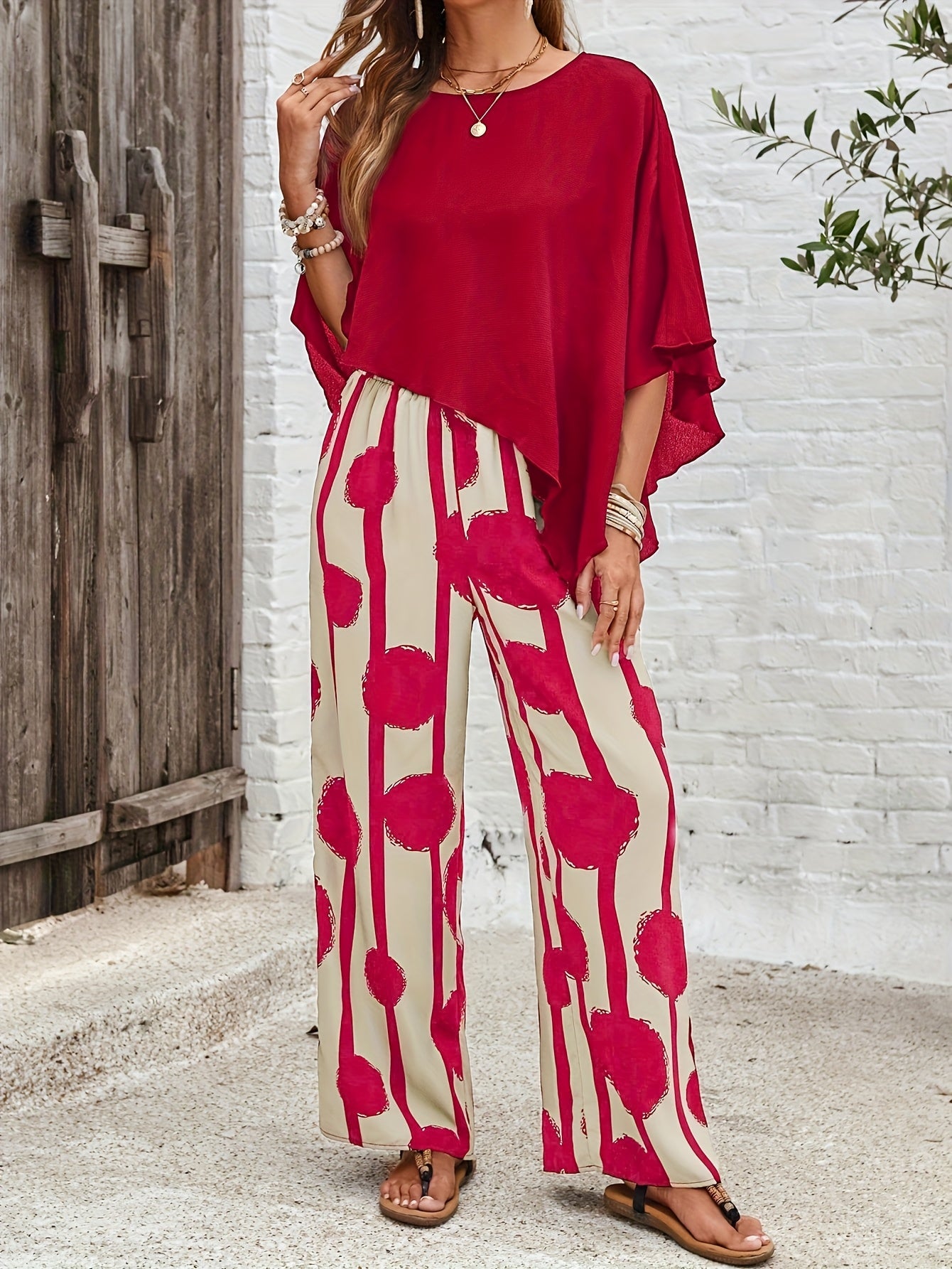 Women's Solid Crew Asymmetrical Hem Shirt And Full Body Print Pant Set