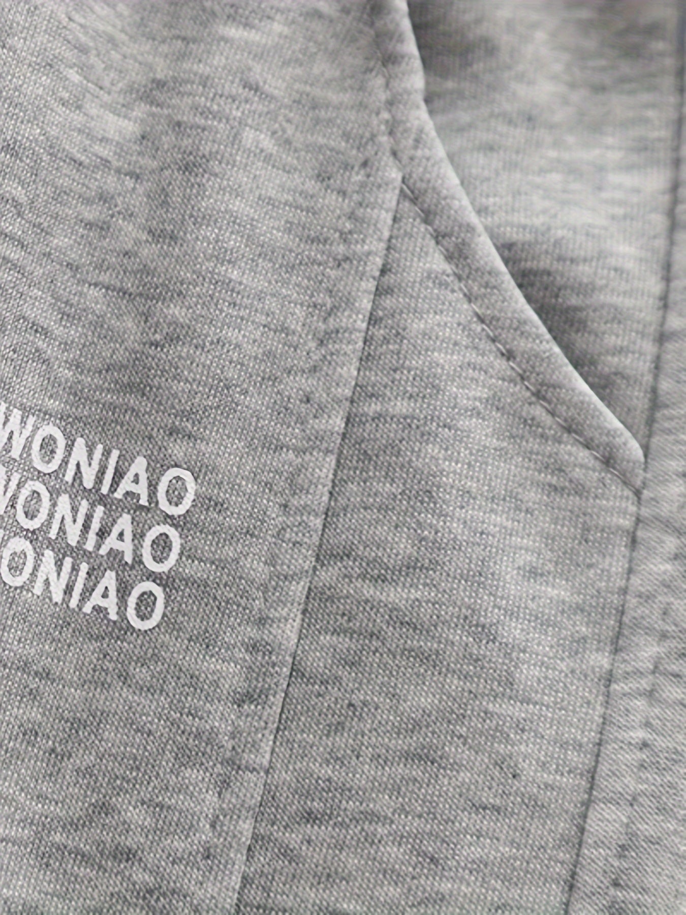 Wwowoniao Boys' Relaxed Fit Jogger Pants Made from a Featuring an Alphabet Design, Slightly Stretchy Knit Material, Equipped with Pockets, Suitable for Spring And Fall, Composed of 58% And 42% Polyester, Ideal for Outdoor Activities