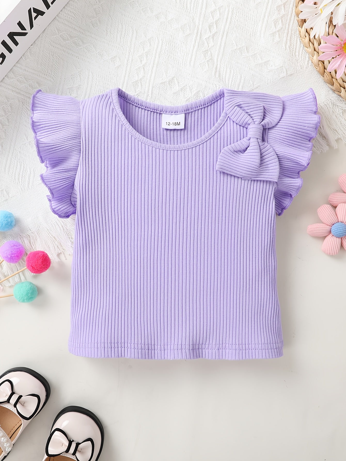 A Charming Two-Piece Outfit Featuring Delightful Details for Young Girls, Including a Ruffled Top with Butterfly Bows And Butterfly-Patterned Shorts, Perfect for Summer Outings And Festive Occasions, for Outdoor