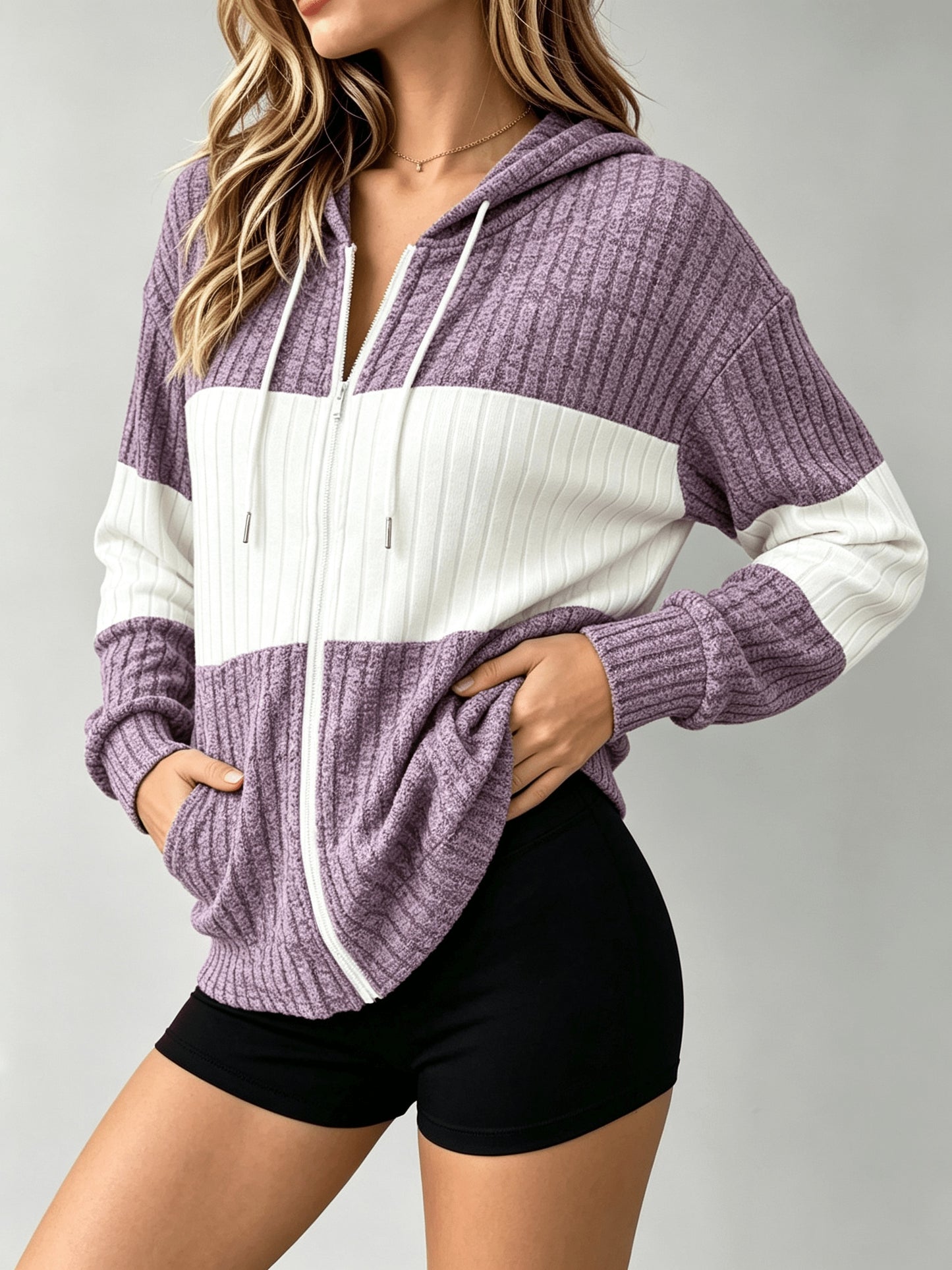 A Hooded Cardigan with Color Blocks Is Essential for And Office Employees When They Are Out And about Or Visiting Cafes in Their Everyday Lives. It Is Lightweight, Flexible, And Can Be Washed in a Machine, Making It a Vital Piece for Spring, Fall