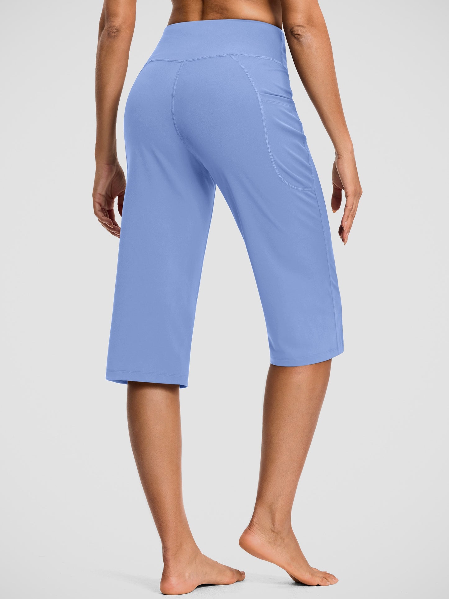 18-Inch Capri Trousers for Women Featuring a High Waist, Pockets, Tummy Control, And a Loose Straight Leg Design Suitable for Workouts And