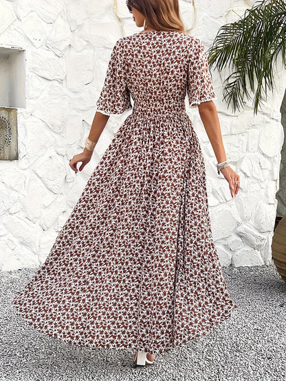 Women's V-neckline Is Elegantly Printed, And The Atmosphere Is Tasseled Dress