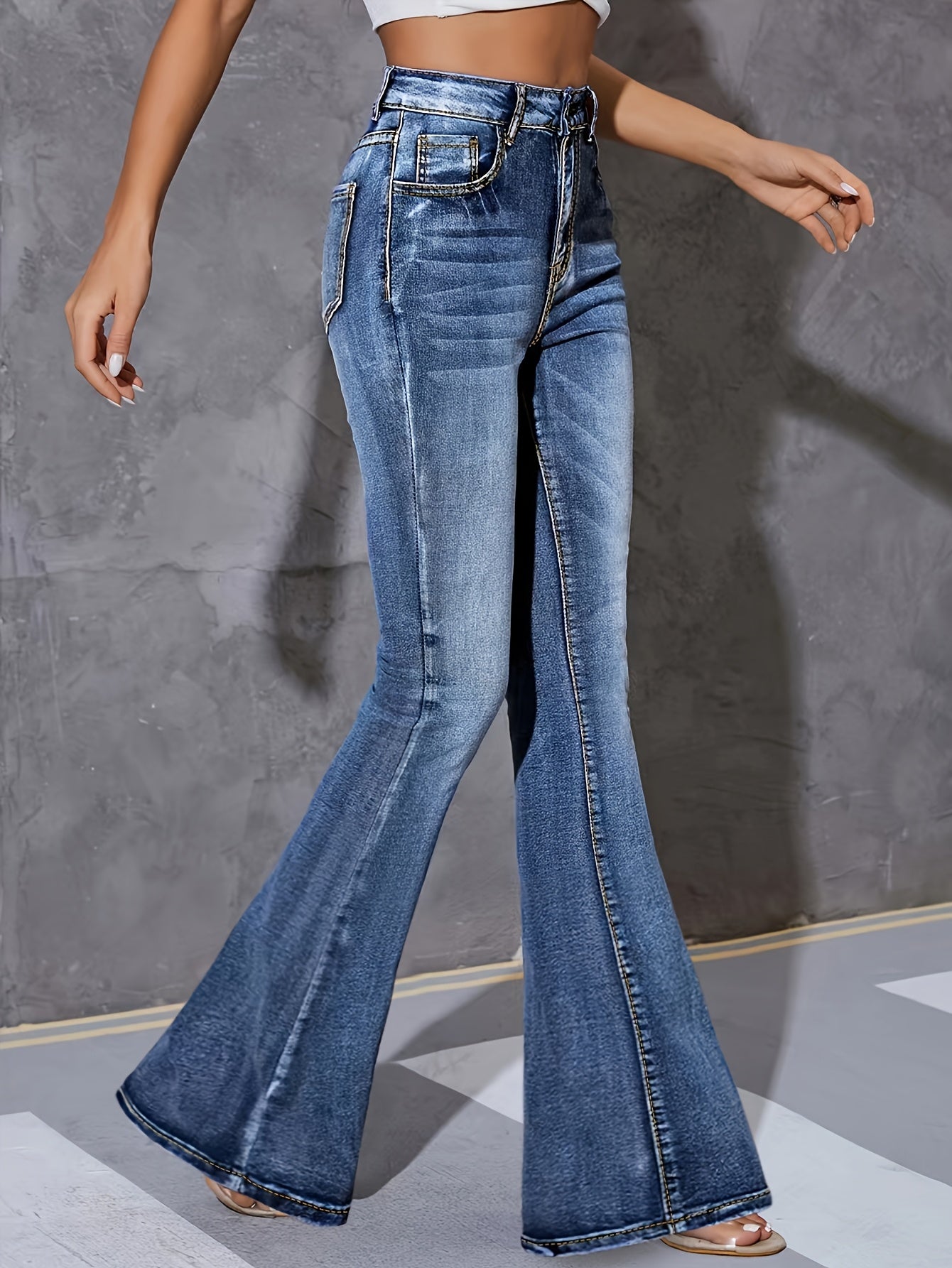 Fashionable And Versatile High-Waisted Stretchy Blue Flared Jeans for Women.
