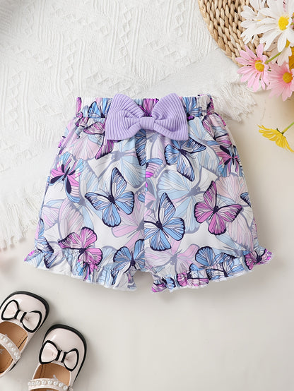 A Charming Two-Piece Outfit Featuring Delightful Details for Young Girls, Including a Ruffled Top with Butterfly Bows And Butterfly-Patterned Shorts, Perfect for Summer Outings And Festive Occasions, for Outdoor