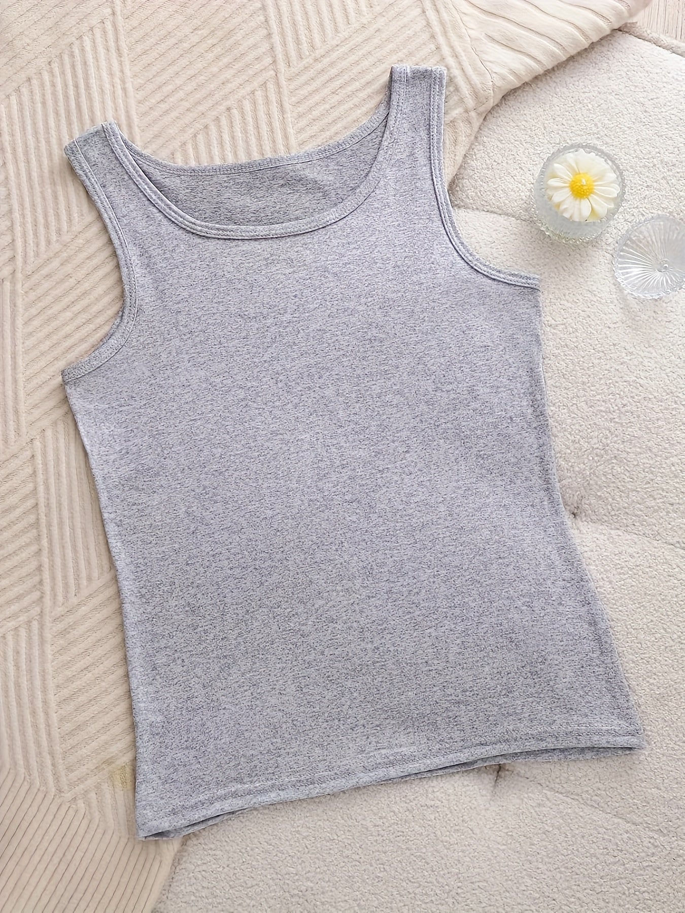 A Set of Six Women'S Soft Adhesive Vests in Various Colors Including Black, White, Gray, Pink, Rose Red, And Green. These Sleeveless Shirts Are Elastic, Breathable, And Comfortable for All Seasons, Making Them Ideal for Home And Casual Outings