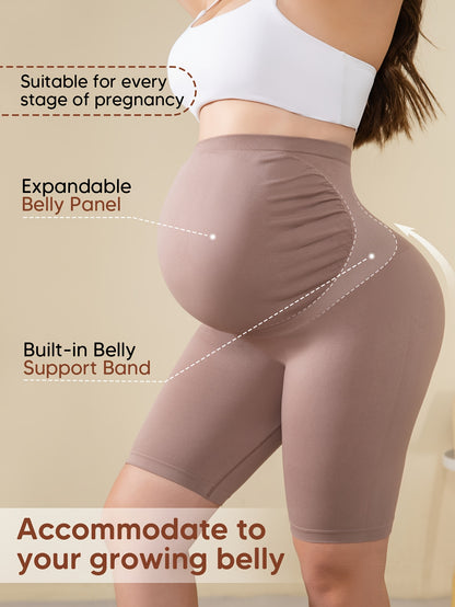 Beige High-Waisted Maternity Shorts Featuring Back Support, an Expandable Belly Panel, And a Built-In Band for Comfort During Pregnancy. They Are Breathable And Stretchy with a Ribbed Design, Perfect for Yoga And Casual Wear