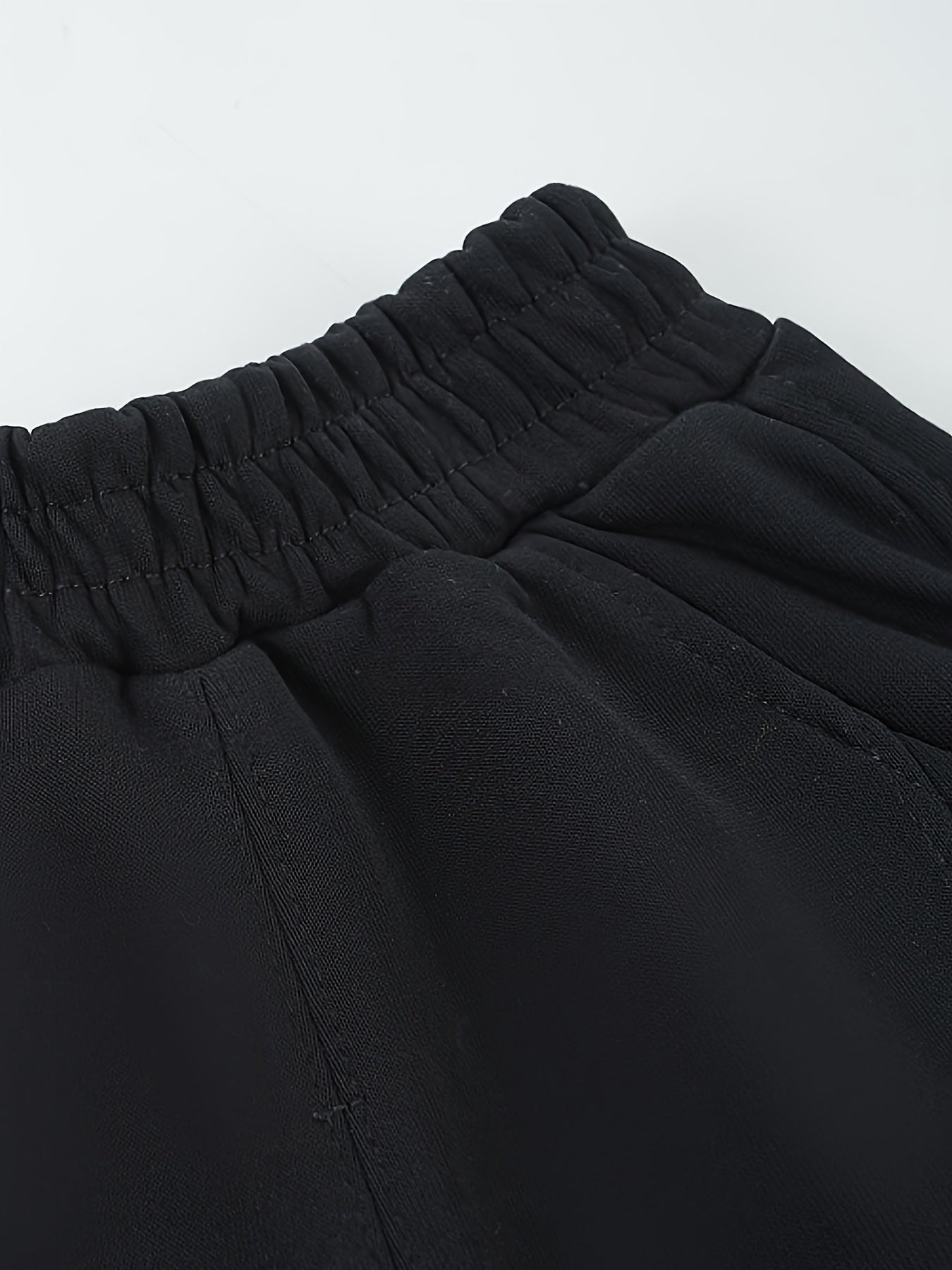 Wwowoniao Boys' Relaxed Fit Jogger Pants Made from a Featuring an Alphabet Design, Slightly Stretchy Knit Material, Equipped with Pockets, Suitable for Spring And Fall, Composed of 58% And 42% Polyester, Ideal for Outdoor Activities