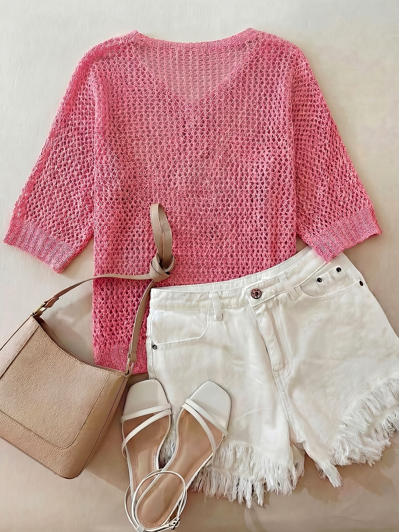 A Stylish Loose-Fitting Top with a Solid Color, V-Neck, And Hollow Design, Featuring Short Sleeves And New.