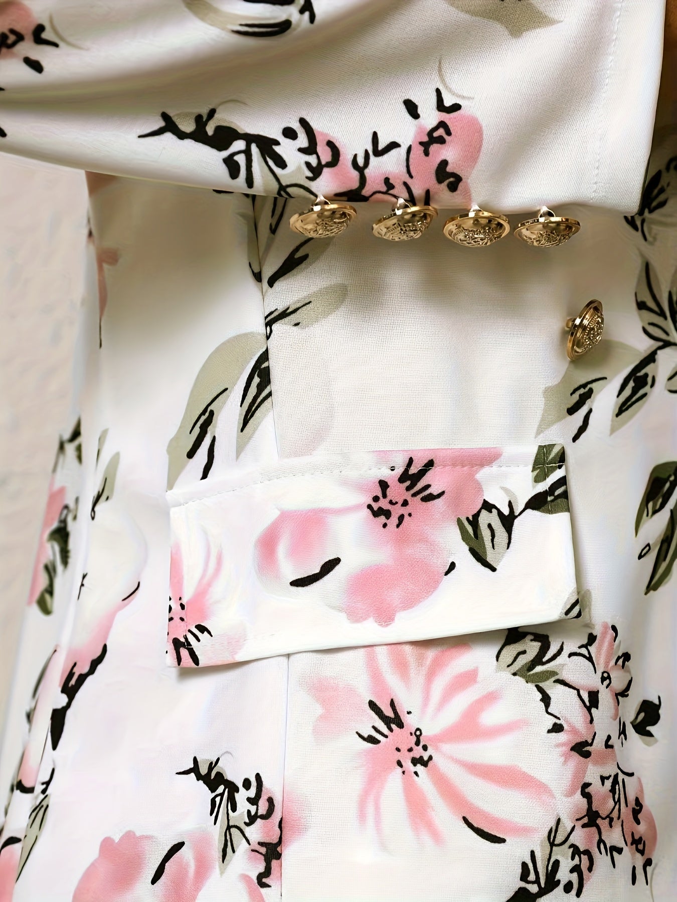 Stylish Two-Piece Outfit Featuring a Chic Double-Breasted Blazer And a High-Waisted Floral Mini Skirt, a Fresh Addition for Women.