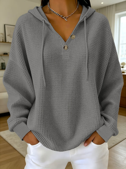 A Plain-Colored Waffle V-Neck Hoodie with Buttons Is Ideal for Everyday Travel