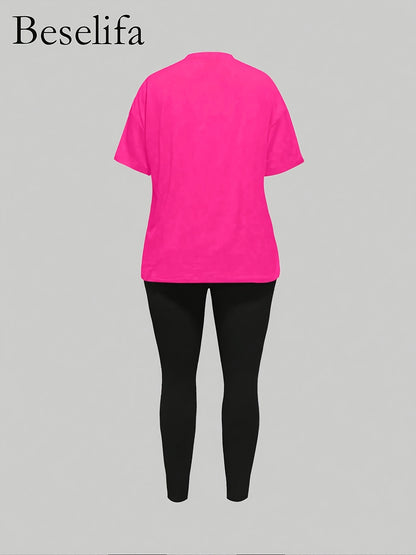 A Two-Piece Set for Women Featuring a Round Neck, Short Sleeves, And a Digital Pattern, Designed for Casual And Comfortable Daily Wear