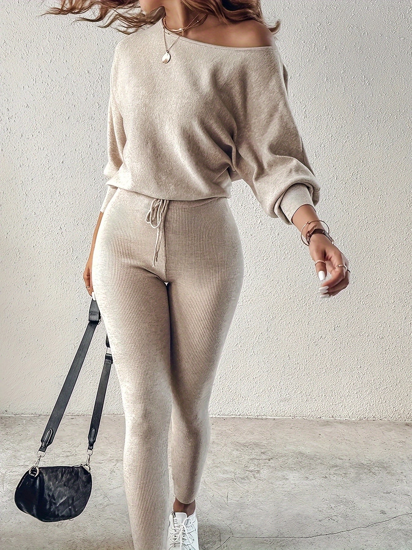 Casual Two-Piece Outfit Featuring a Long-Sleeve Pullover And High-Waisted Drawstring Pants, Ideal for