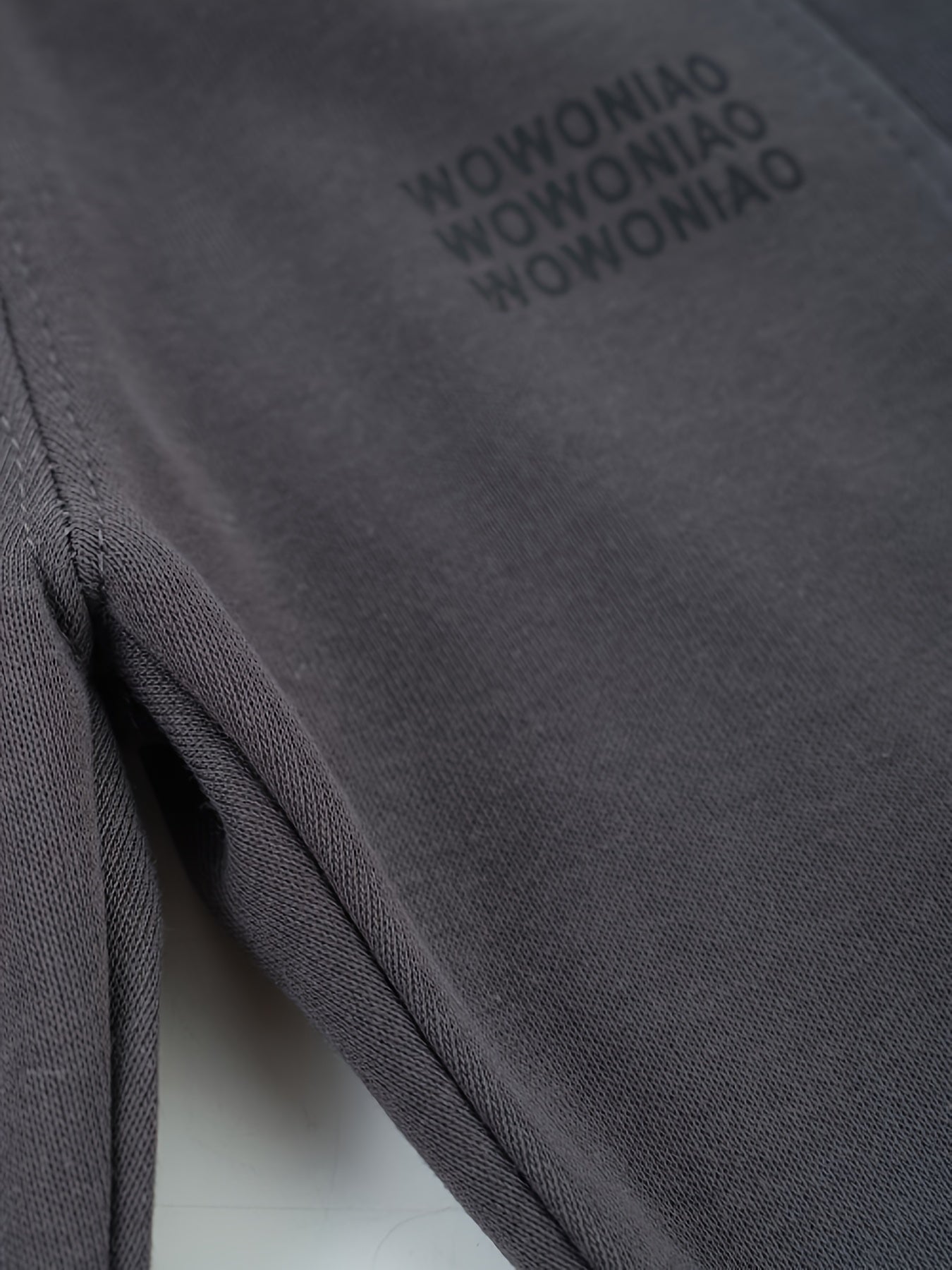 Wwowoniao Boys' Relaxed Fit Jogger Pants Made from a Featuring an Alphabet Design, Slightly Stretchy Knit Material, Equipped with Pockets, Suitable for Spring And Fall, Composed of 58% And 42% Polyester, Ideal for Outdoor Activities