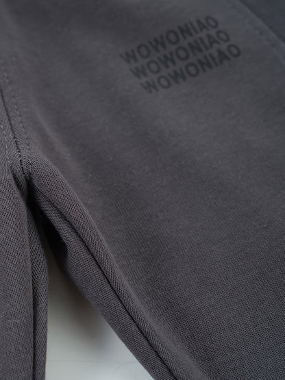 Wwowoniao Boys' Relaxed Fit Jogger Pants Made from a Featuring an Alphabet Design, Slightly Stretchy Knit Material, Equipped with Pockets, Suitable for Spring And Fall, Composed of 58% And 42% Polyester, Ideal for Outdoor Activities