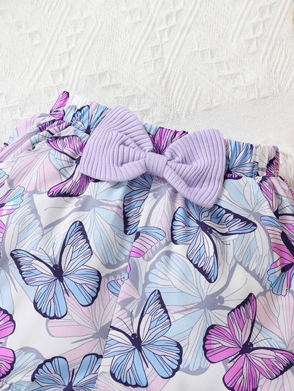 A Charming Two-Piece Outfit Featuring Delightful Details for Young Girls, Including a Ruffled Top with Butterfly Bows And Butterfly-Patterned Shorts, Perfect for Summer Outings And Festive Occasions, for Outdoor