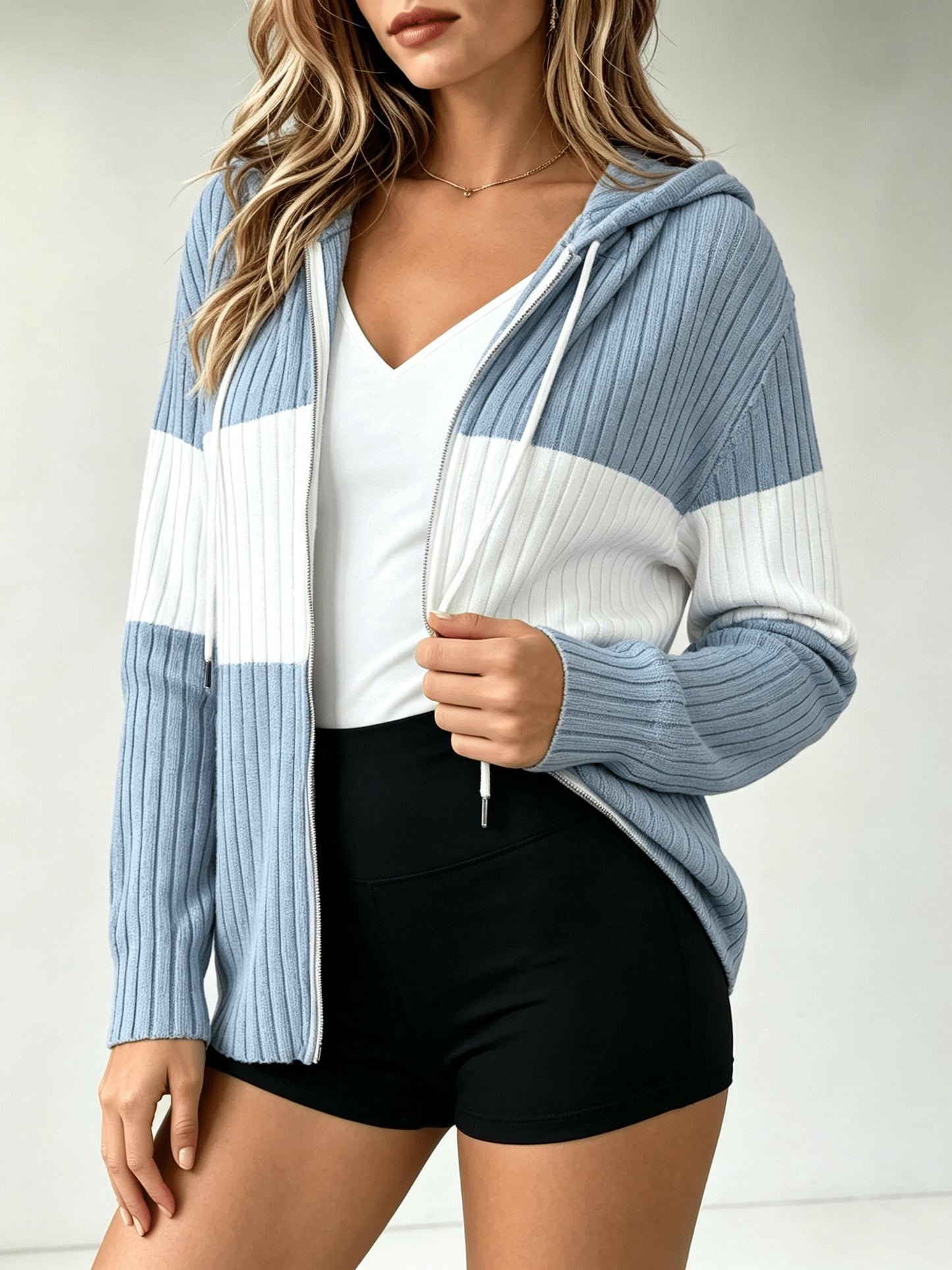 A Hooded Cardigan with Color Blocks Is Essential for And Office Employees When They Are Out And about Or Visiting Cafes in Their Everyday Lives. It Is Lightweight, Flexible, And Can Be Washed in a Machine, Making It a Vital Piece for Spring, Fall