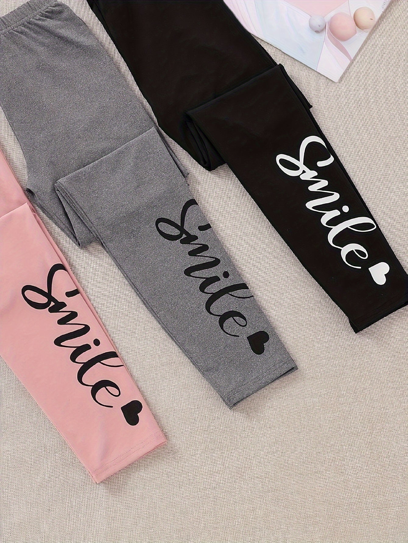 Multi-pack of letter-printed tights, suitable for -8