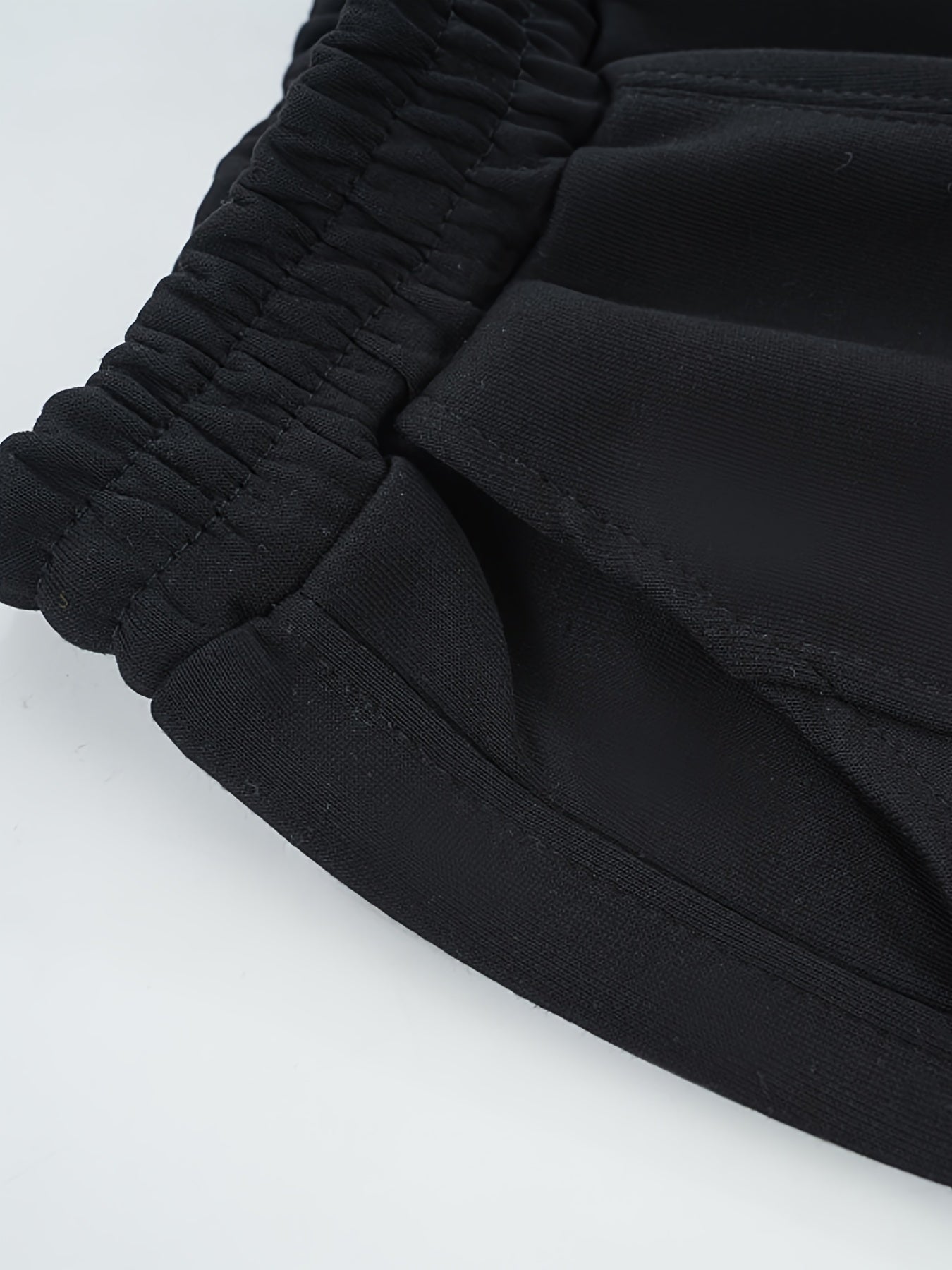Wwowoniao Boys' Relaxed Fit Jogger Pants Made from a Featuring an Alphabet Design, Slightly Stretchy Knit Material, Equipped with Pockets, Suitable for Spring And Fall, Composed of 58% And 42% Polyester, Ideal for Outdoor Activities