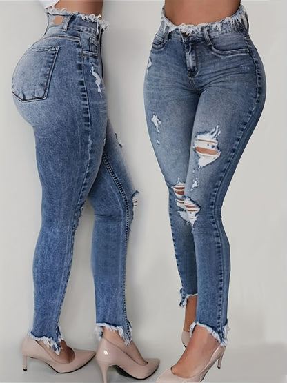 Irregularly Ripped Jeans for Women, Mid-Rise Style, Blue Denim, Featuring a Frayed Edge Design. A Classic And Versatile Choice for Any Season, Part of The New Autumn Collection with Fresh Stock from Local Warehouses. Available at Prices
