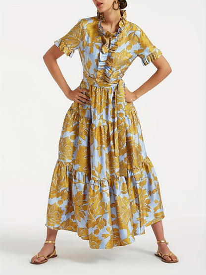 Maxi Dress with a Blue And Yellow Floral Pattern, Featuring Short Sleeves, a Tie Layer, Made from Imitation Tencel Fabric, Adorned with Chest Ruffles, a V-Neck, a Belt, Two Side Pockets, a Tiered Skirt, And a Straight Hem