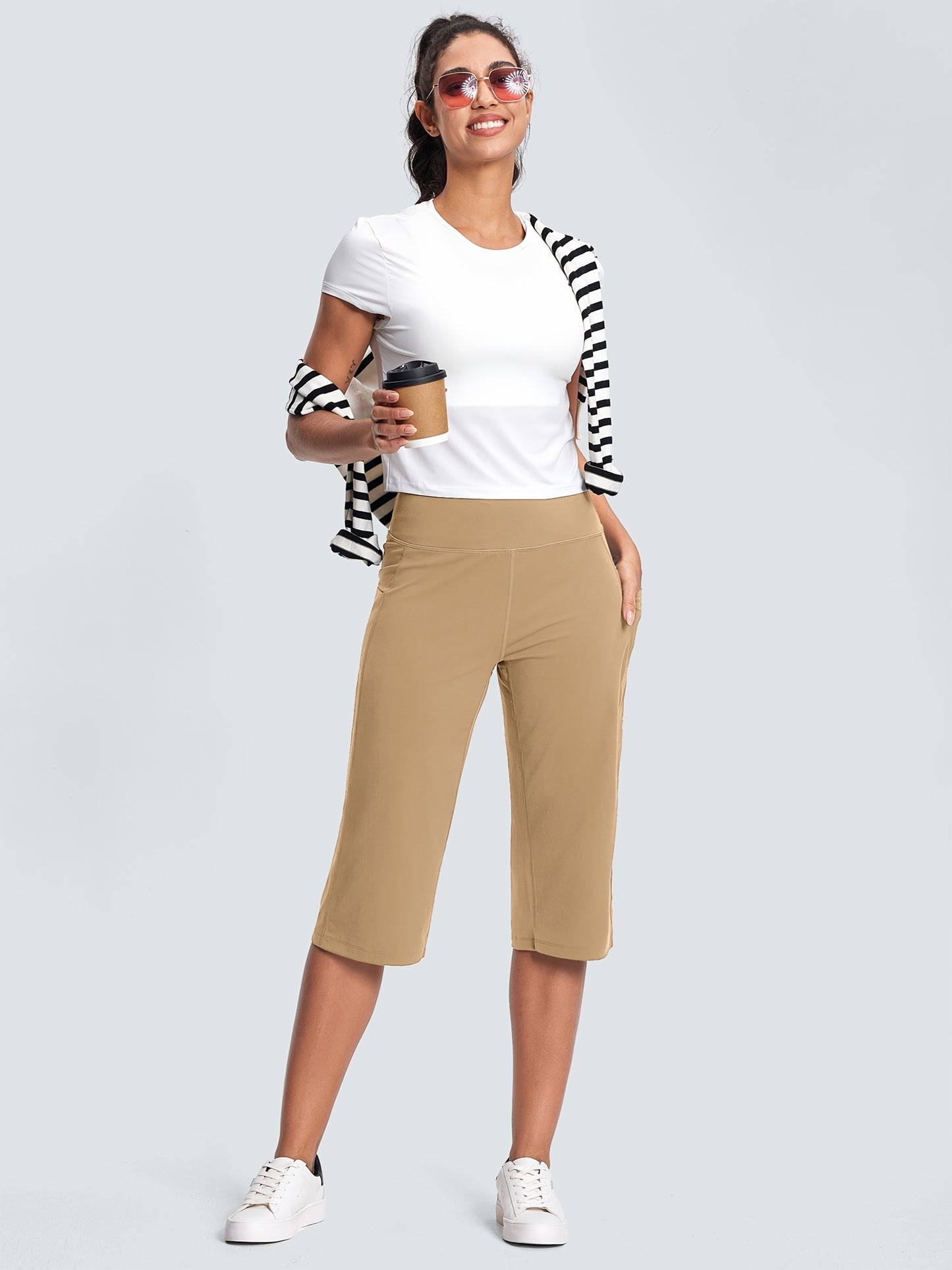18-Inch Capri Trousers for Women Featuring a High Waist, Pockets, Tummy Control, And a Loose Straight Leg Design Suitable for Workouts And