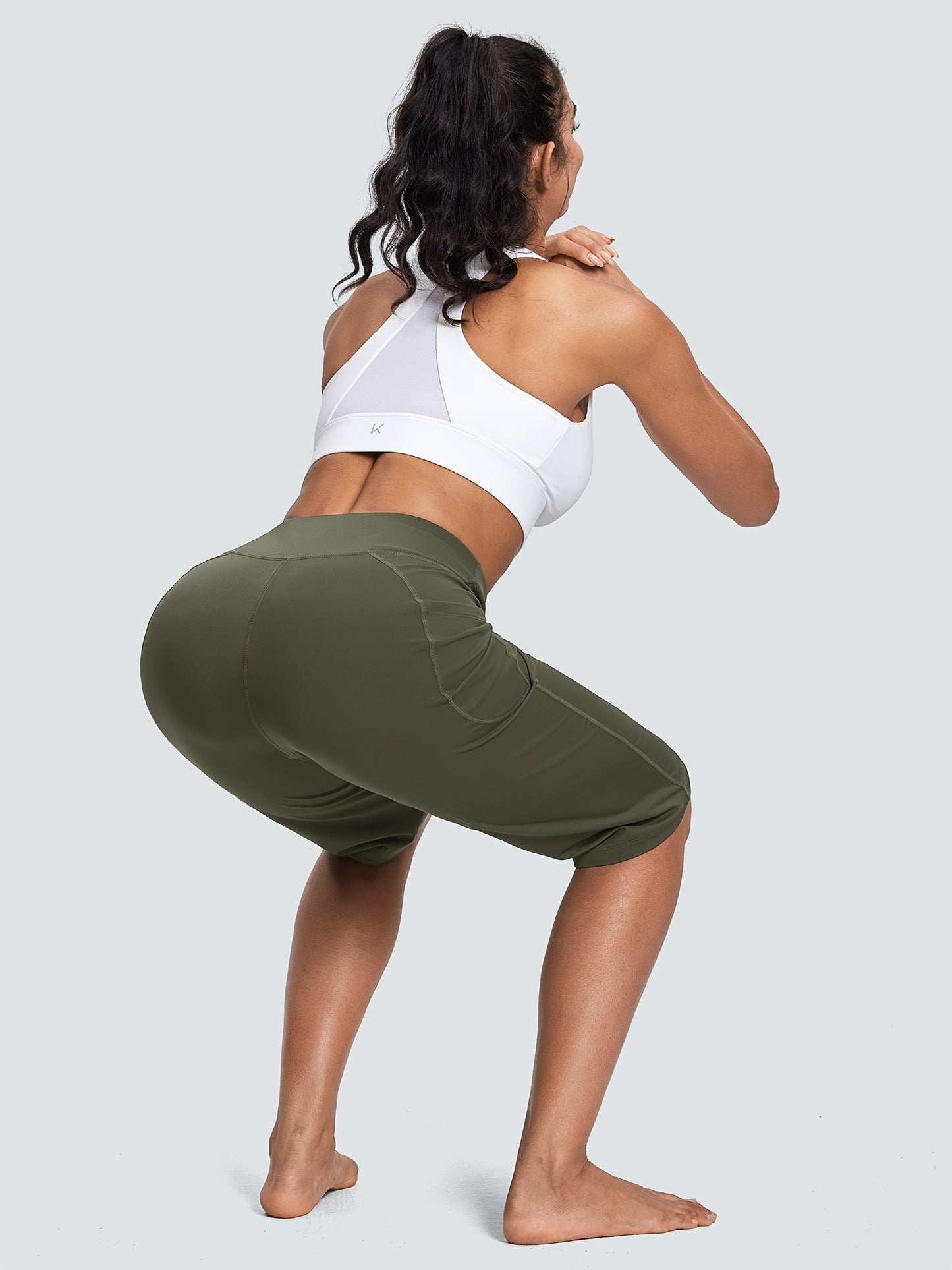 18-Inch Capri Trousers for Women Featuring a High Waist, Pockets, Tummy Control, And a Loose Straight Leg Design Suitable for Workouts And