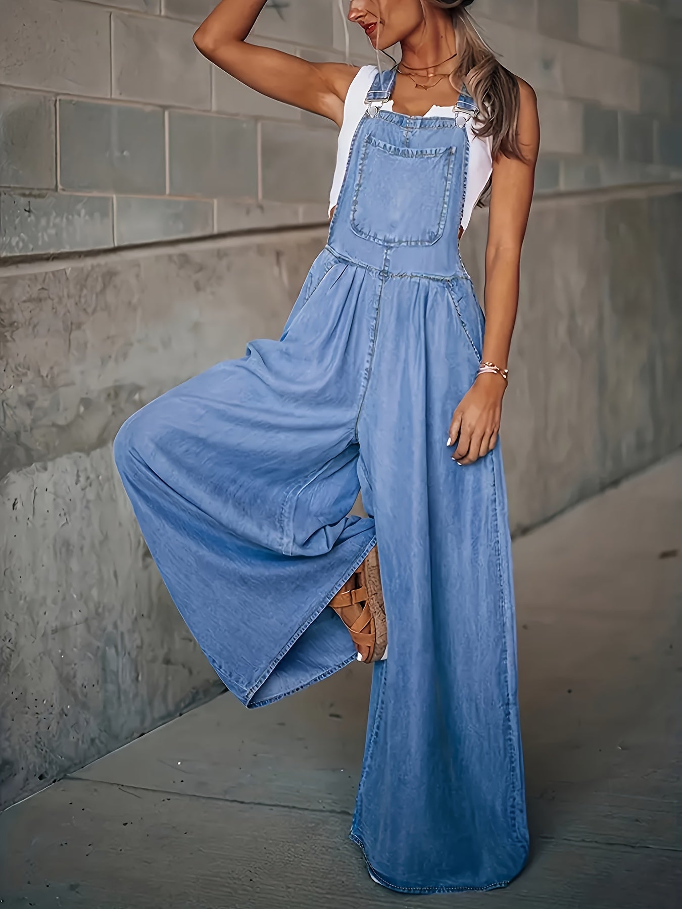 Chic Sleeveless Denim Jumpsuit - Relaxed Fit with Side Pockets, Adjustable Straps - Versatile Day-To-Night Apparel