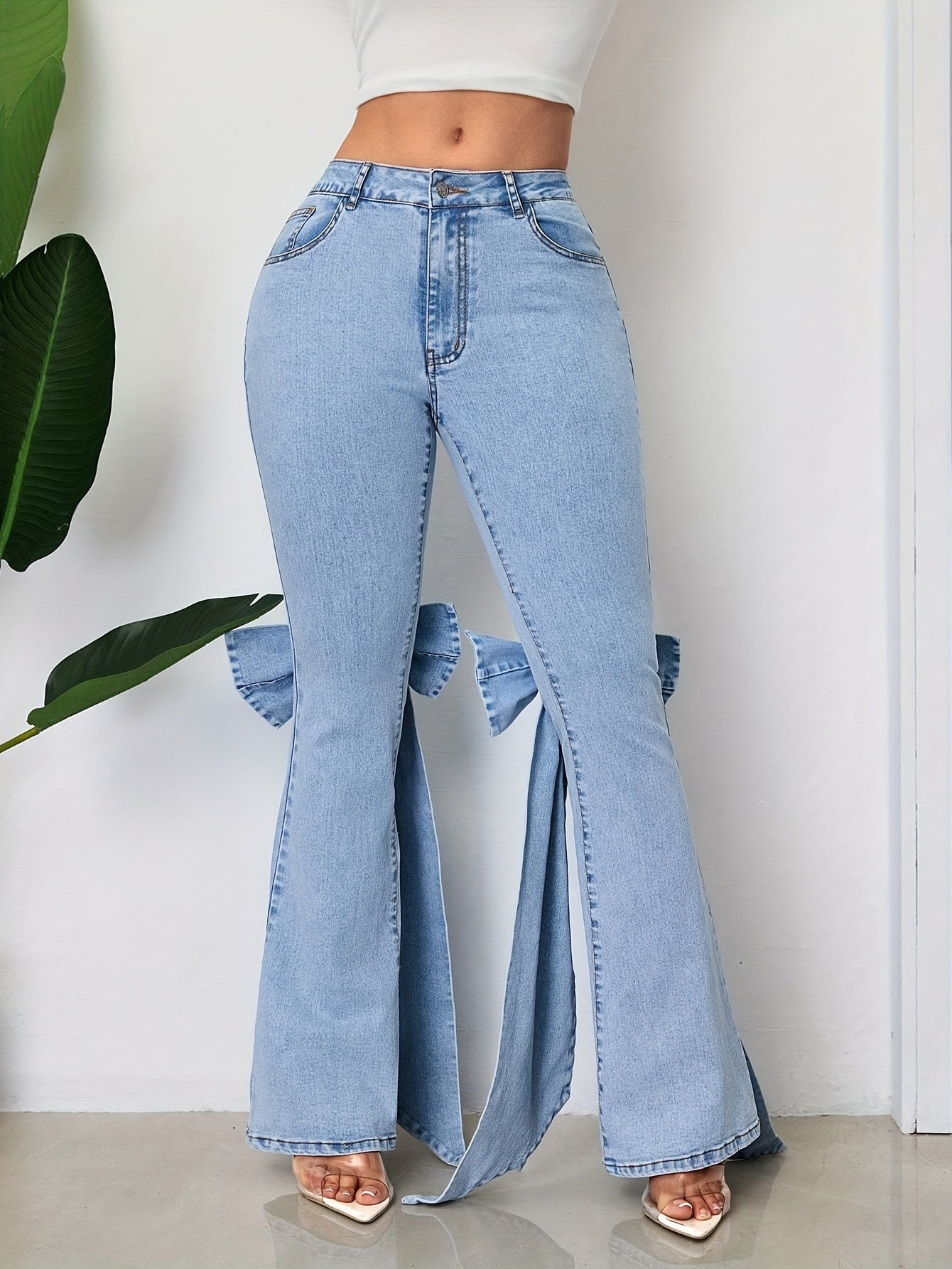 These Mid-Rise Flared Jeans for Women Feature Large Bow Ribbon Accents, Are Slim-Fitting with a Bit of Stretch, And Are Perfect for Any Season And a Variety of Events