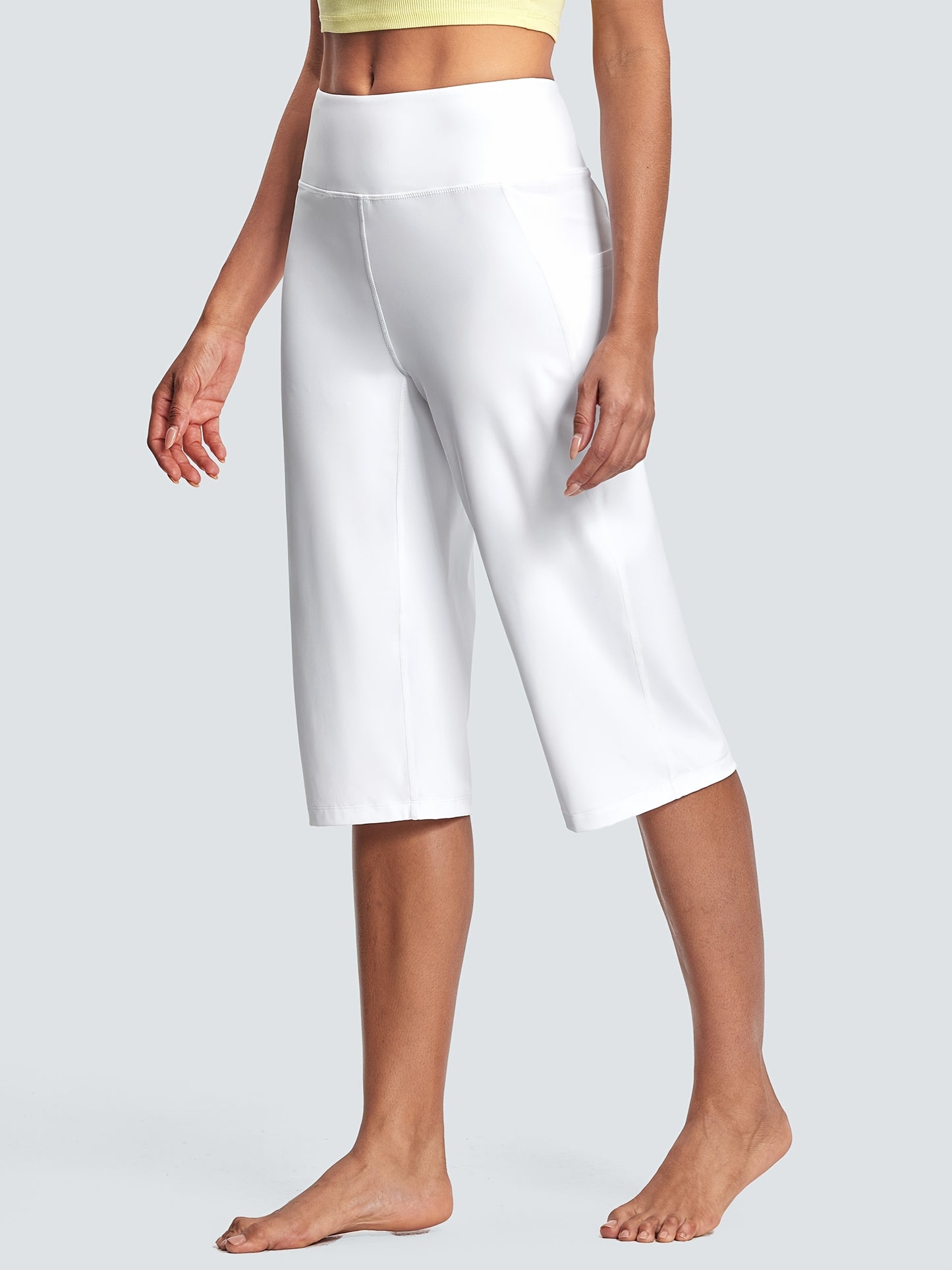 18-Inch Capri Trousers for Women Featuring a High Waist, Pockets, Tummy Control, And a Loose Straight Leg Design Suitable for Workouts And