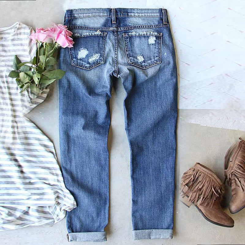 Women'S Distressed Jeans with Patch Printing, Featuring a Cartoon Mouse Pattern Patchwork, a Retro Vintage Style, And "Cartoon Mouse" Printed on The Cuffs