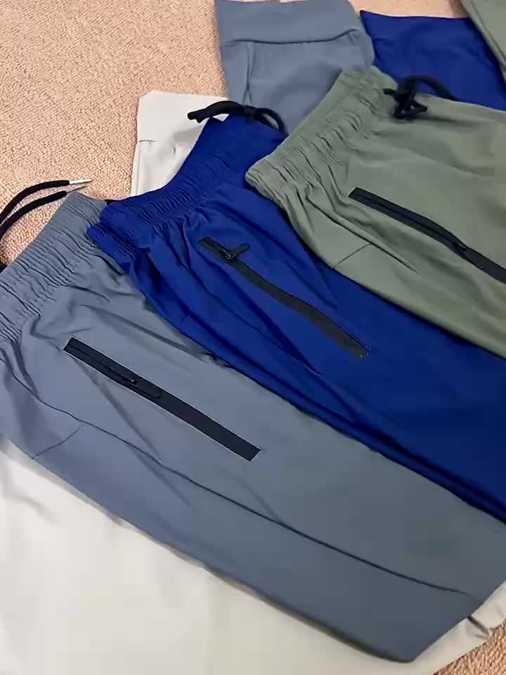 3pcs Men's Summer Solid Color Tapered Sports Pants, High Stretch Fiber, with Ribbed CuffDesign, Nylon 80%Spandex 20%, Reflective Stripe Design At The Hem Of Pants, Regular Fit with ZipperPockets, Breathable ComfortableRunningTraining LongTrousers