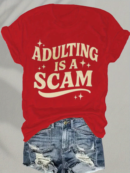 Women's Funny "Blended Adult Is a Scam" T-Shirt - Retro Humorous Slogan Short Sleeve Round Neck Blouse Suitable for Her Gift, Casual Statement Top for Daily Wear & Humor Apparel, Machine Washable Comfortable Everyday Outfits