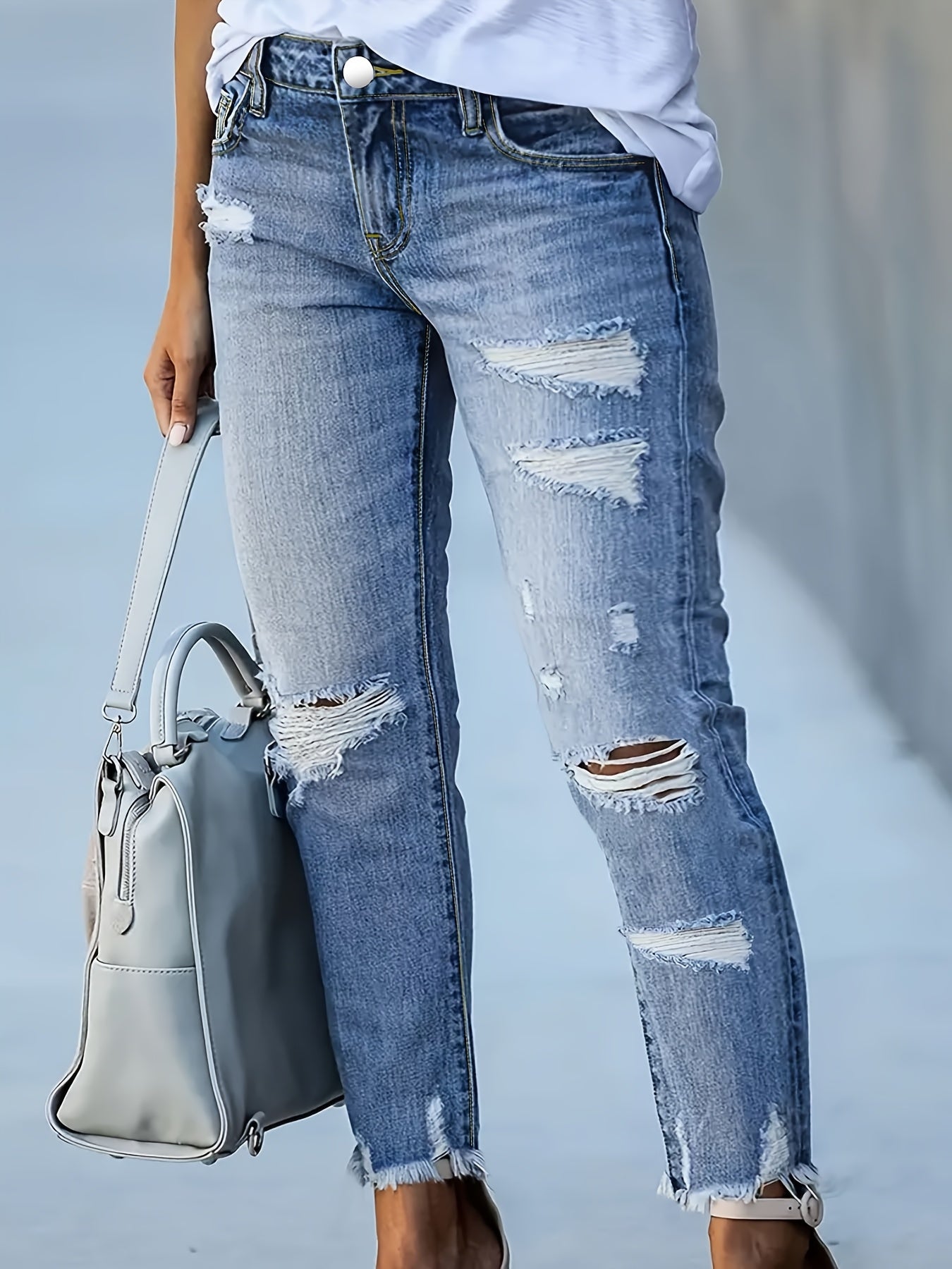 Plus Size Women's Blue Distressed Washed Denim Jeans | Multiple Rips & Destroyed Hem | Slim Fit, Unique Design | Versatile Stylish Style for All-Season Commuting