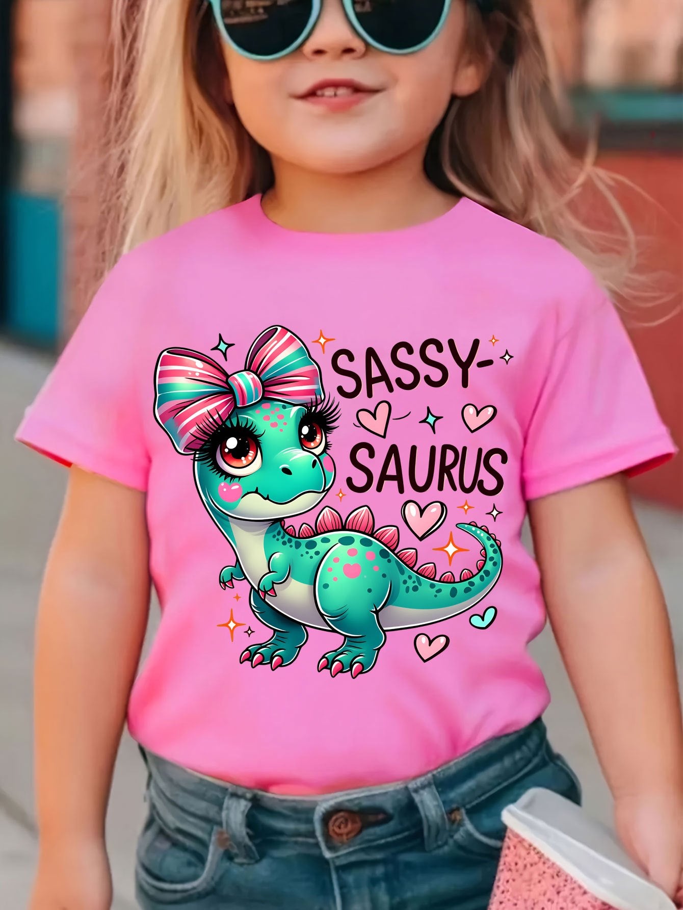 Fashion Girls' "SASSY SAURUS" Cartoon Letter Print Loose T-Shirt | Casual Summer Knit Top with Crew Neck, Slight Stretch Fabric, Regular Sleeves, Asymmetrical Hem - GOURD DOLL