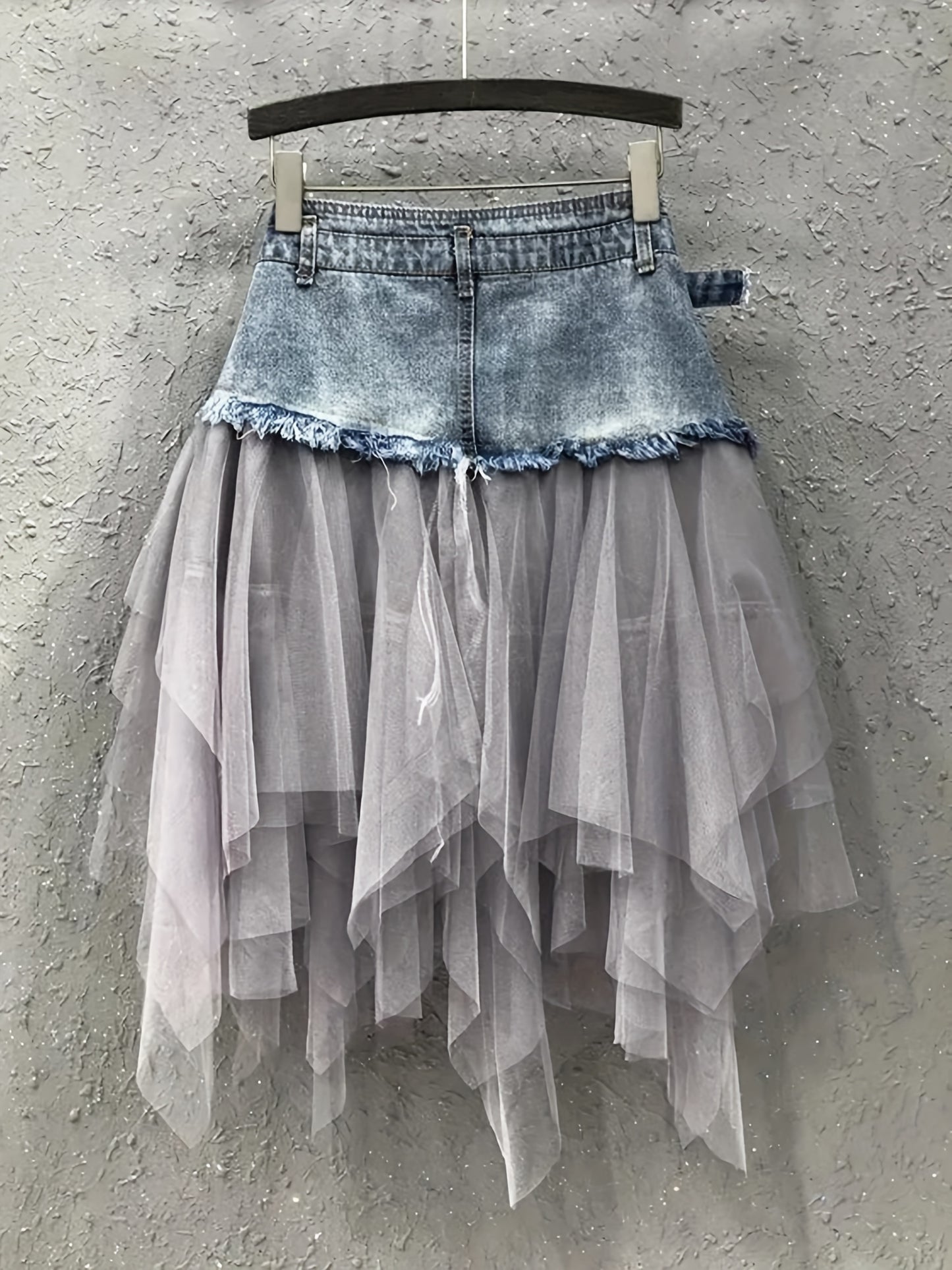 A Midi Skirt for Spring, Summer, And Autumn, Combining Denim And Tulle with a Trendy Raw-Edge Hem