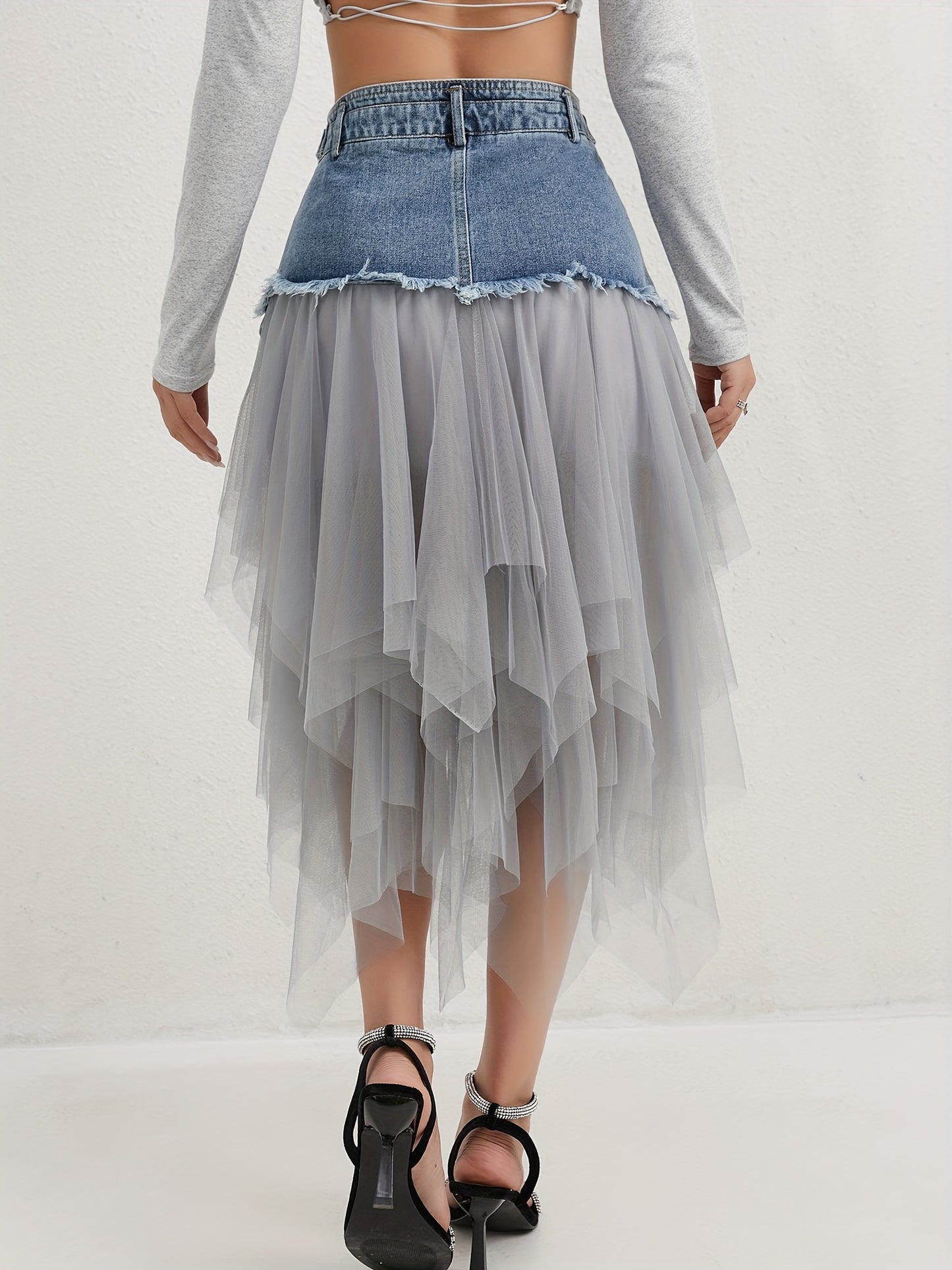 A Midi Skirt for Spring, Summer, And Autumn, Combining Denim And Tulle with a Trendy Raw-Edge Hem