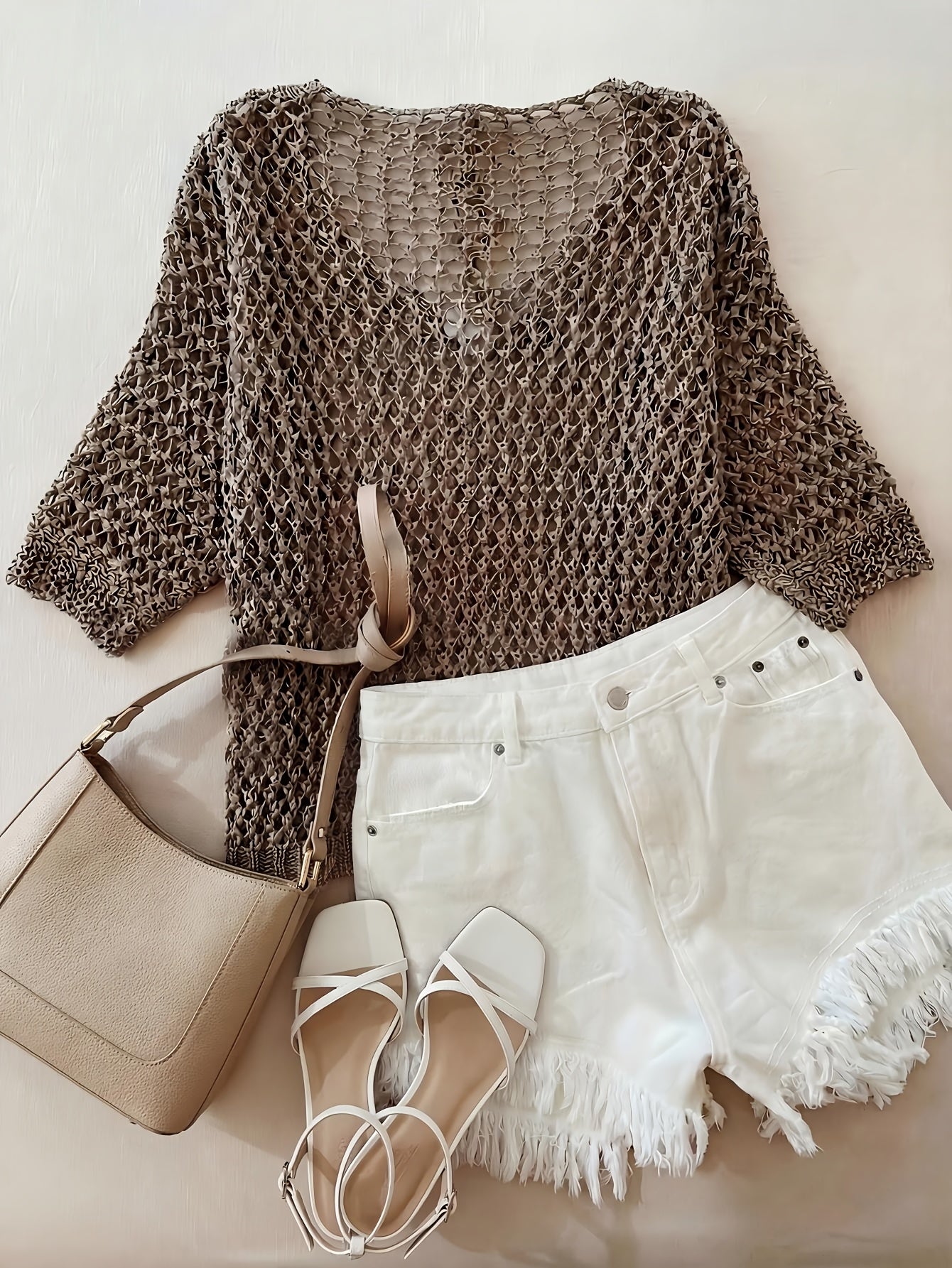 A Stylish Loose-Fitting Top with a Solid Color, V-Neck, And Hollow Design, Featuring Short Sleeves And New.