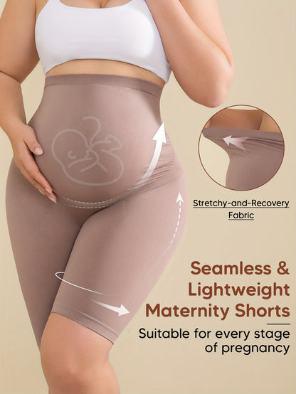 Beige High-Waisted Maternity Shorts Featuring Back Support, an Expandable Belly Panel, And a Built-In Band for Comfort During Pregnancy. They Are Breathable And Stretchy with a Ribbed Design, Perfect for Yoga And Casual Wear