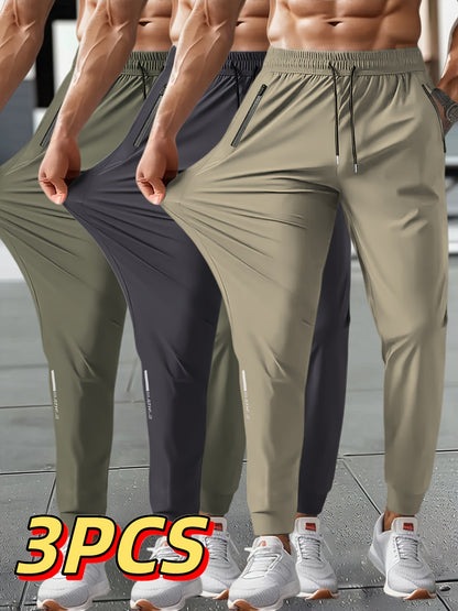 3pcs Men's Summer Solid Color Tapered Sports Pants, High Stretch Fiber, with Ribbed CuffDesign, Nylon 80%Spandex 20%, Reflective Stripe Design At The Hem Of Pants, Regular Fit with ZipperPockets, Breathable ComfortableRunningTraining LongTrousers