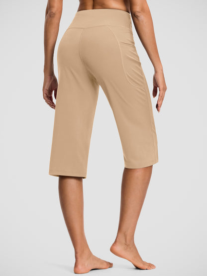 18-Inch Capri Trousers for Women Featuring a High Waist, Pockets, Tummy Control, And a Loose Straight Leg Design Suitable for Workouts And