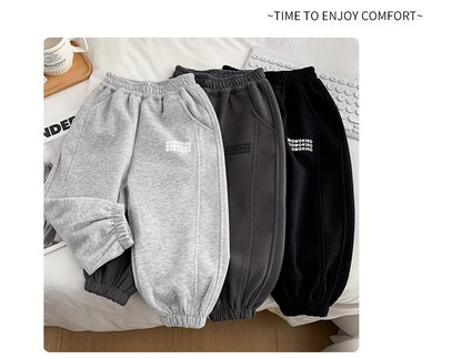 Wwowoniao Boys' Relaxed Fit Jogger Pants Made from a Featuring an Alphabet Design, Slightly Stretchy Knit Material, Equipped with Pockets, Suitable for Spring And Fall, Composed of 58% And 42% Polyester, Ideal for Outdoor Activities