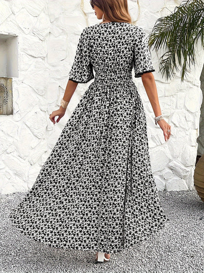 Women's V-neckline Is Elegantly Printed, And The Atmosphere Is Tasseled Dress