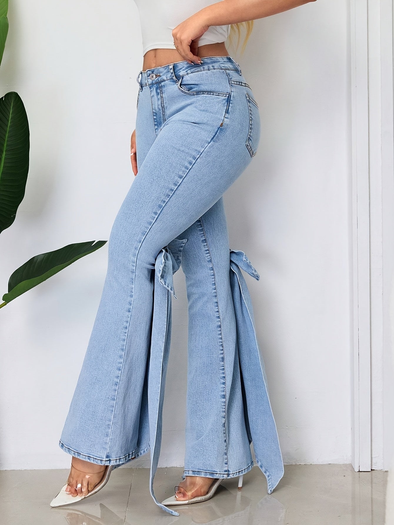 These Mid-Rise Flared Jeans for Women Feature Large Bow Ribbon Accents, Are Slim-Fitting with a Bit of Stretch, And Are Perfect for Any Season And a Variety of Events