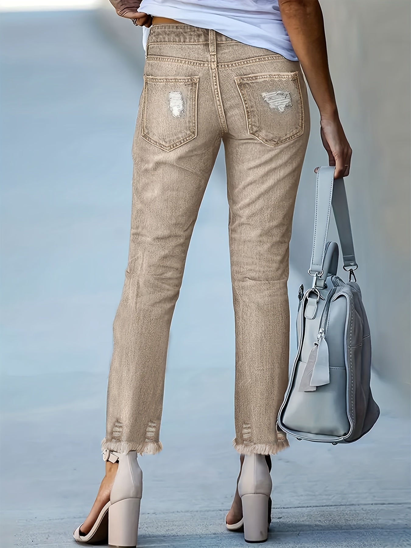 Plus Size Women's Blue Distressed Washed Denim Jeans | Multiple Rips & Destroyed Hem | Slim Fit, Unique Design | Versatile Stylish Style for All-Season Commuting