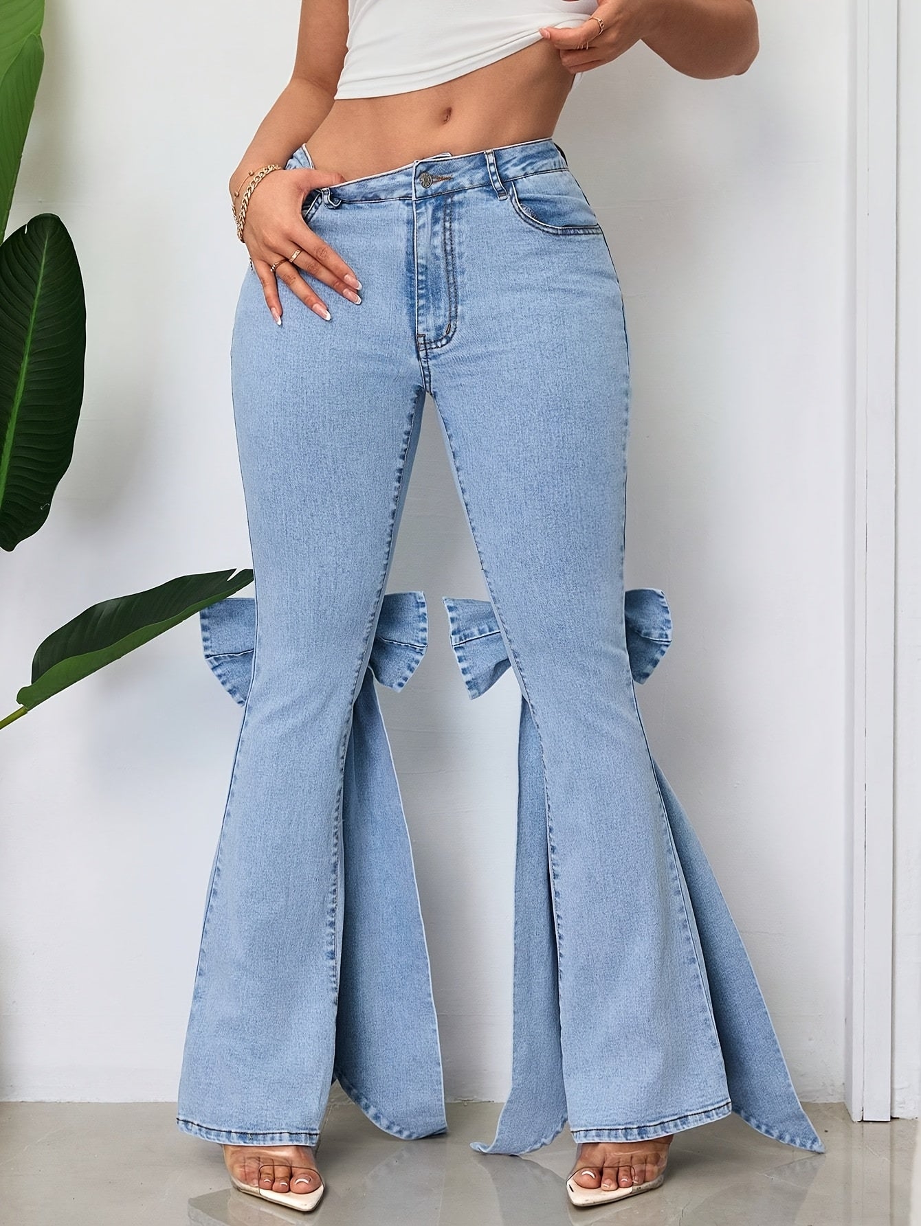These Mid-Rise Flared Jeans for Women Feature Large Bow Ribbon Accents, Are Slim-Fitting with a Bit of Stretch, And Are Perfect for Any Season And a Variety of Events
