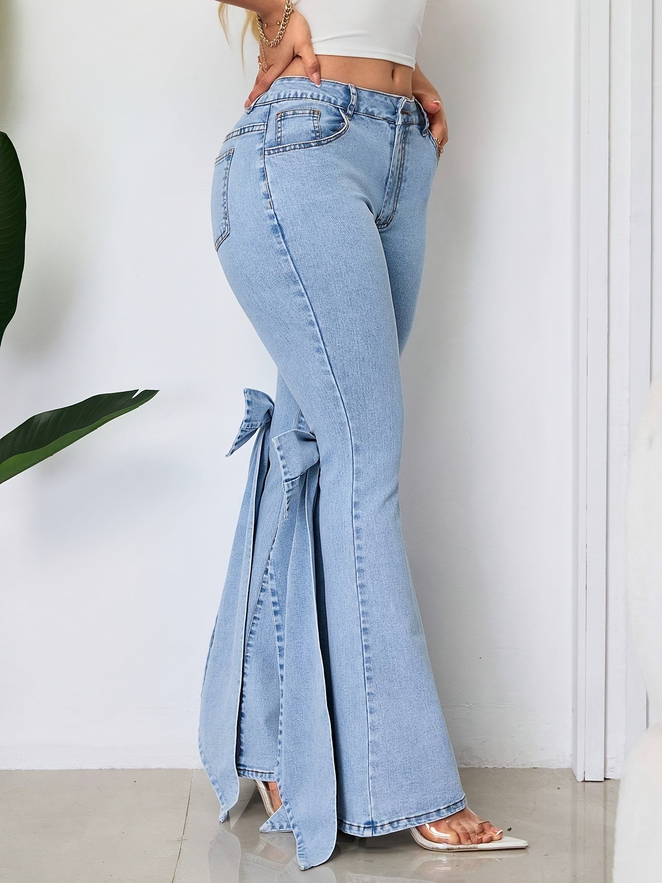 These Mid-Rise Flared Jeans for Women Feature Large Bow Ribbon Accents, Are Slim-Fitting with a Bit of Stretch, And Are Perfect for Any Season And a Variety of Events