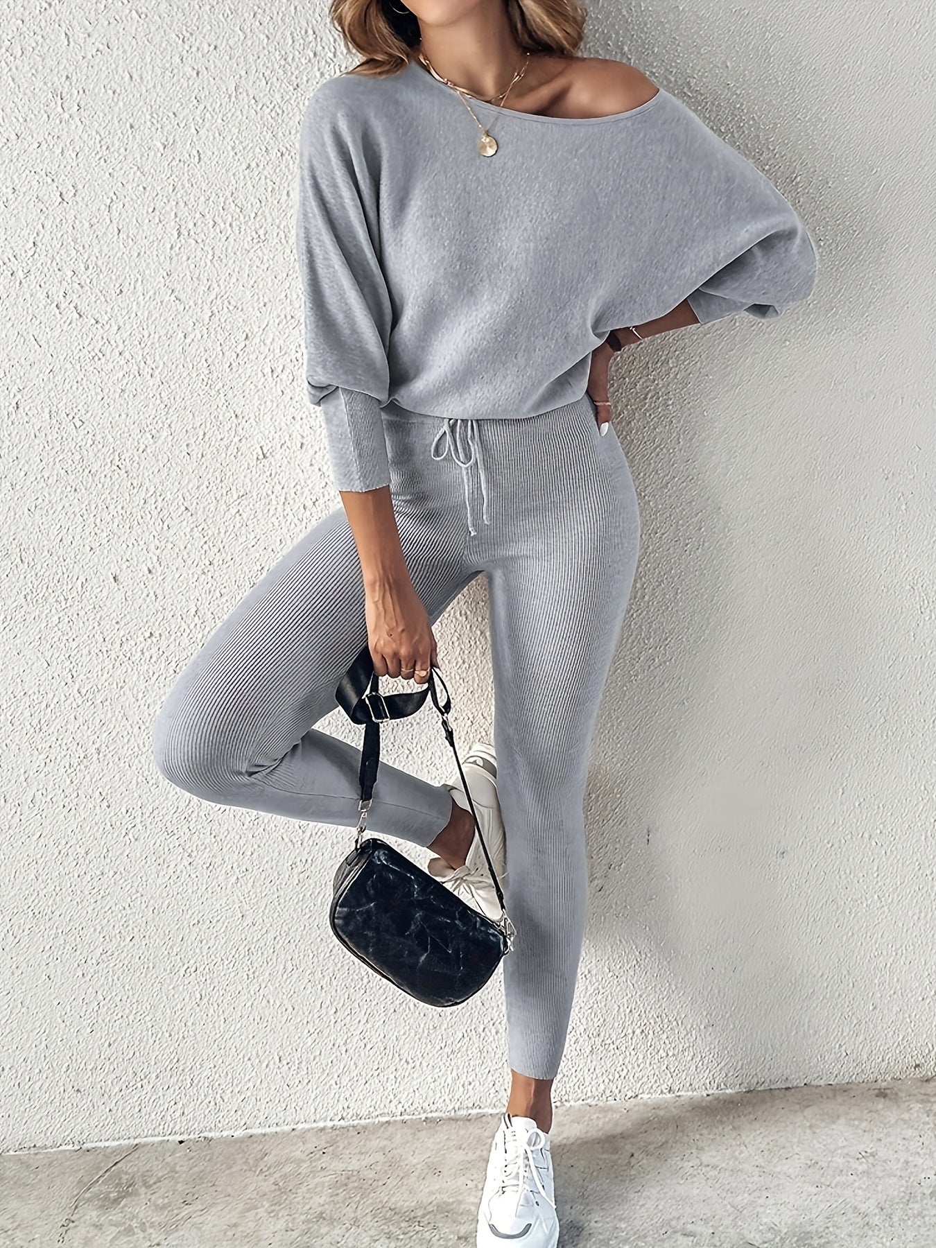 Casual Two-Piece Outfit Featuring a Long-Sleeve Pullover And High-Waisted Drawstring Pants, Ideal for