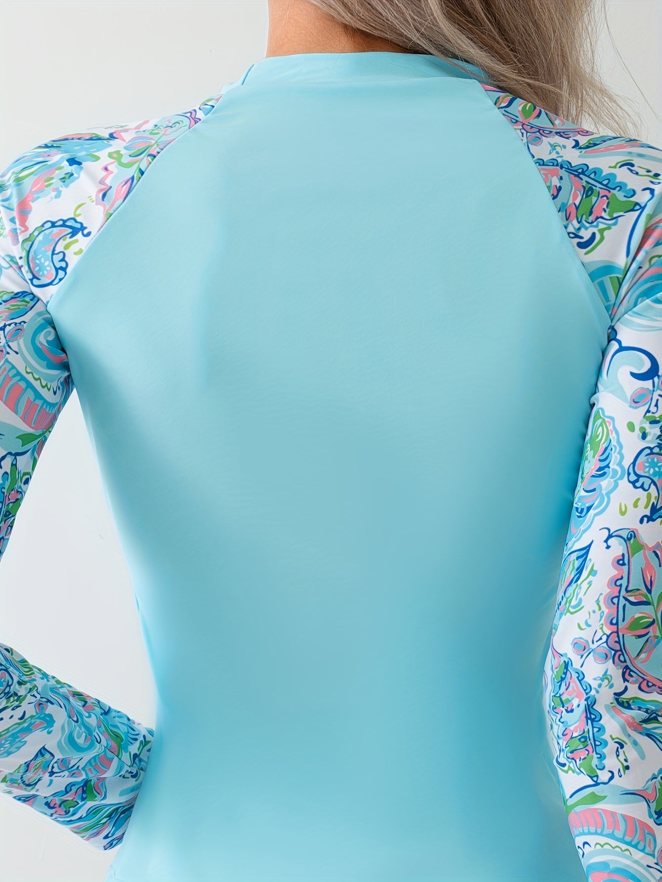 Two-Piece Outfit Featuring a Long-Sleeve Tankini Top And Shorts for Women