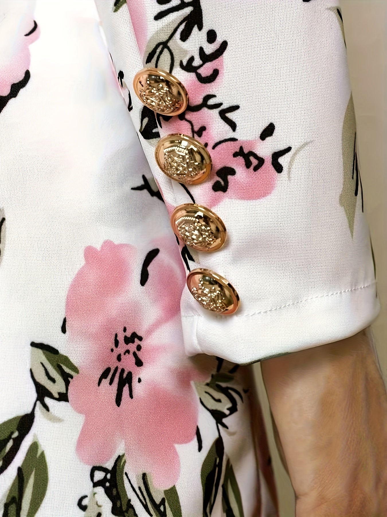 Stylish Two-Piece Outfit Featuring a Chic Double-Breasted Blazer And a High-Waisted Floral Mini Skirt, a Fresh Addition for Women.