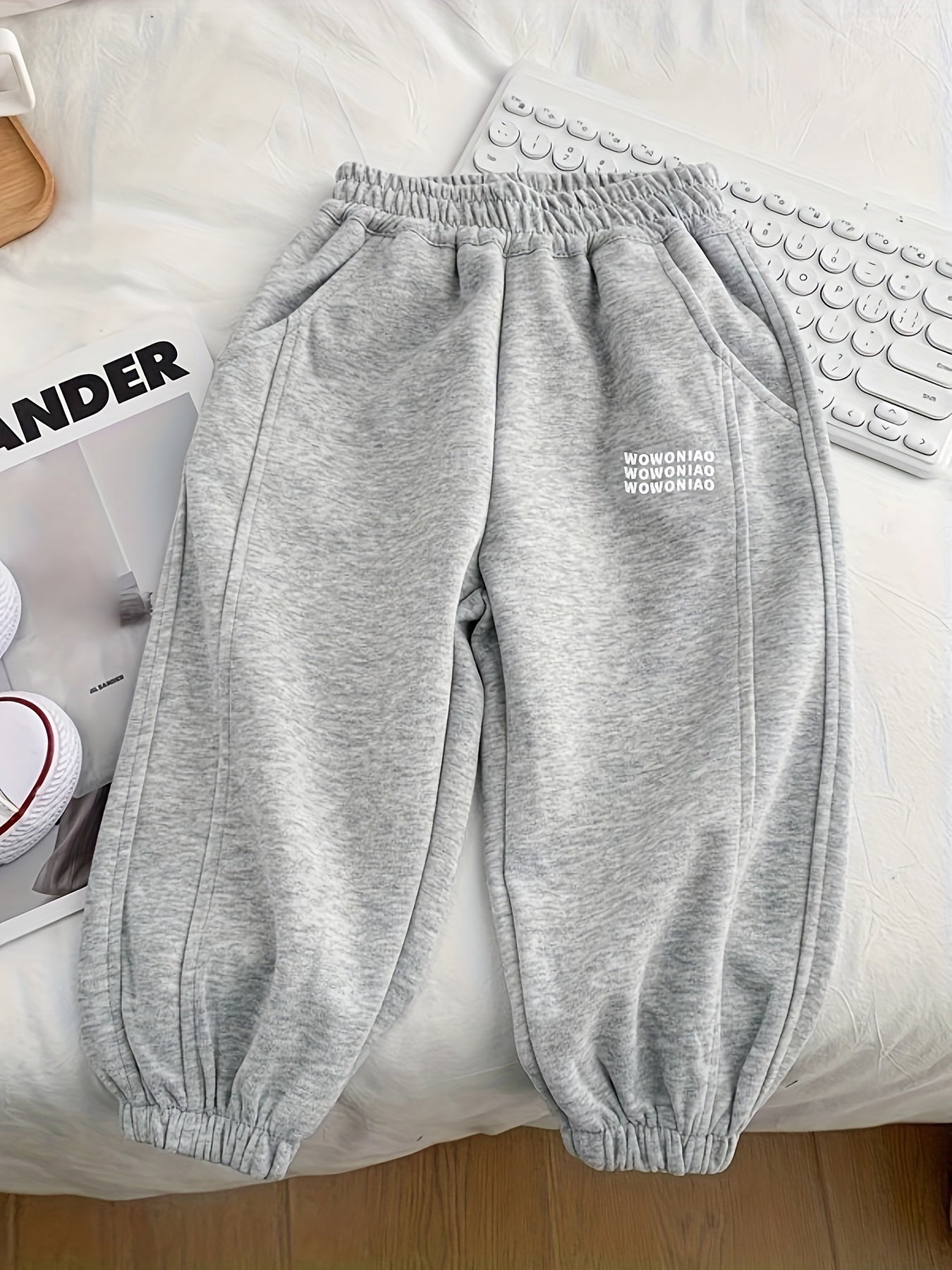 Wwowoniao Boys' Relaxed Fit Jogger Pants Made from a Featuring an Alphabet Design, Slightly Stretchy Knit Material, Equipped with Pockets, Suitable for Spring And Fall, Composed of 58% And 42% Polyester, Ideal for Outdoor Activities